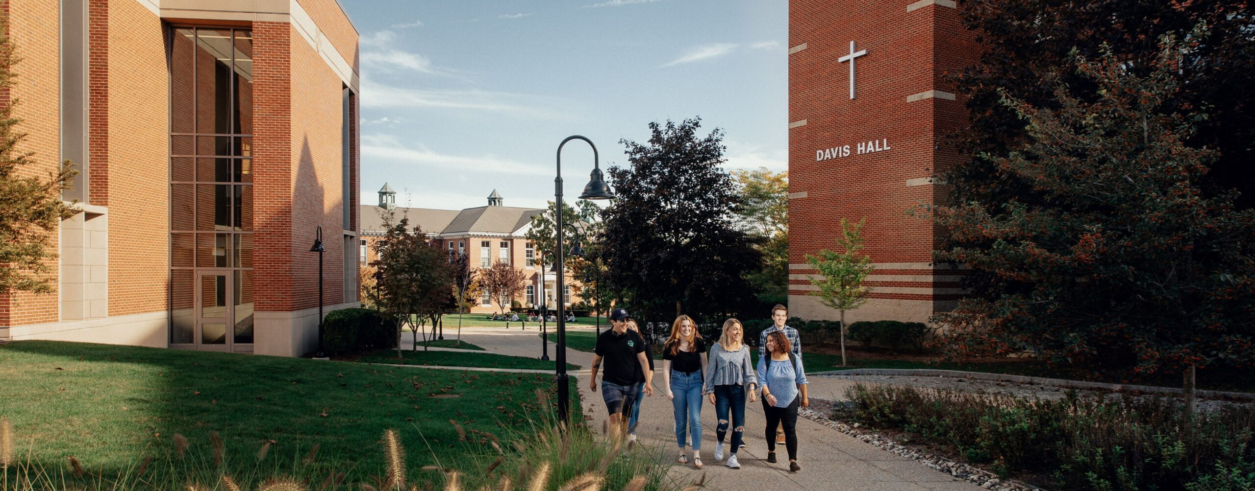 Students walking by Davis Hall.